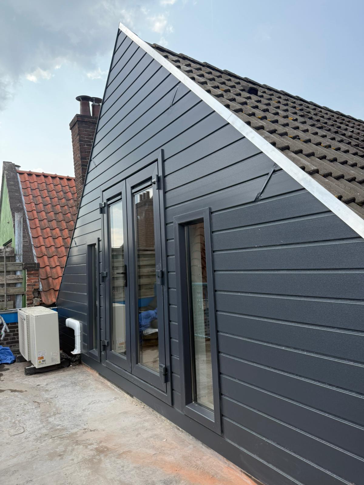 Gevelbekleding op een huis als bescherming tegen het milieu